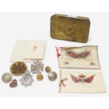 A WWI British 1914 Princess Mary brass Christmas gift tin, with greeting card in envelope, etc.,