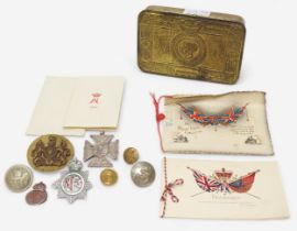 A WWI British 1914 Princess Mary brass Christmas gift tin, with greeting card in envelope, etc.,