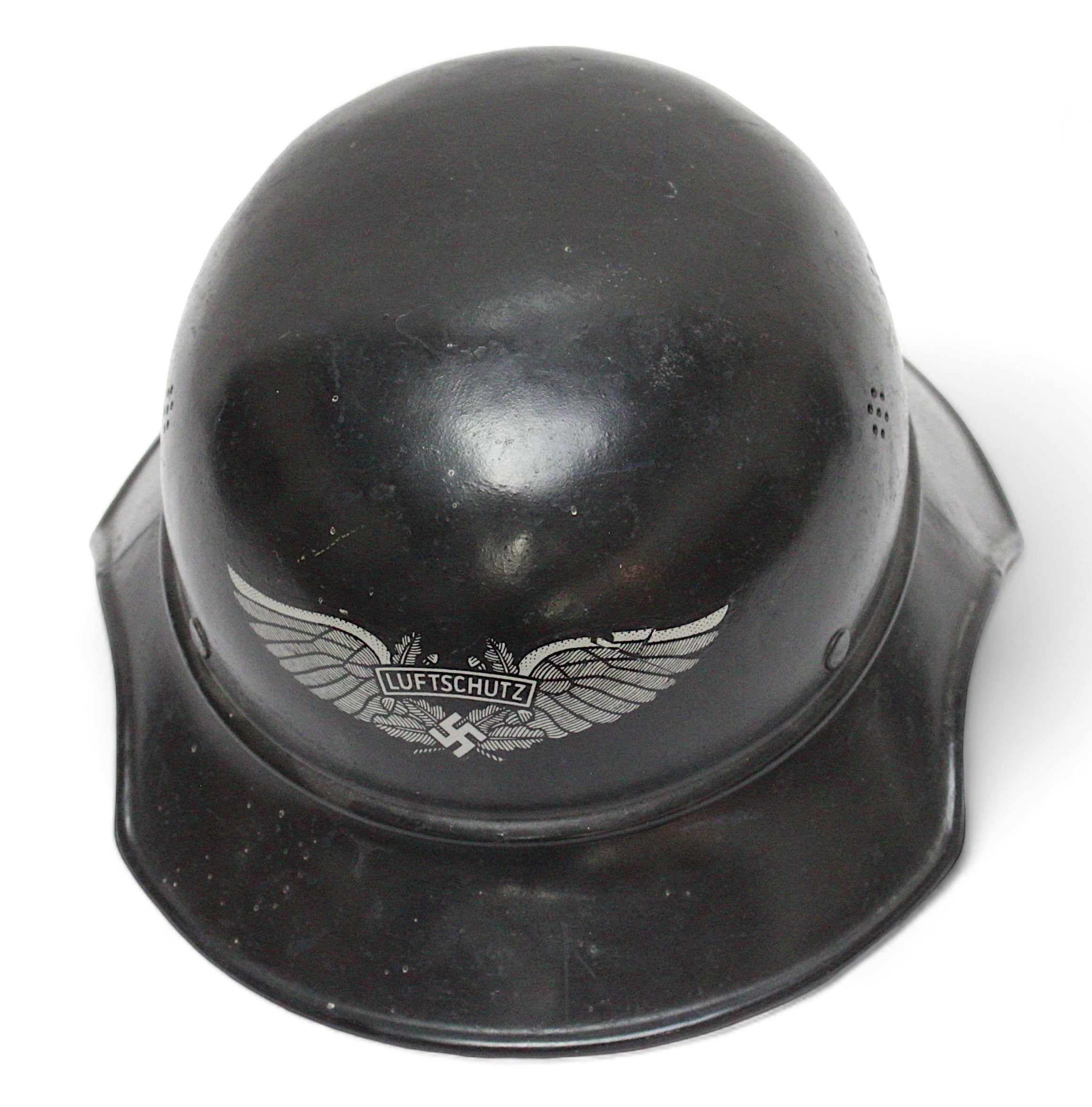 A German WWII Luftschutz ‘Air Raid Protection’ steel helmet, gladiator pattern, with liner and