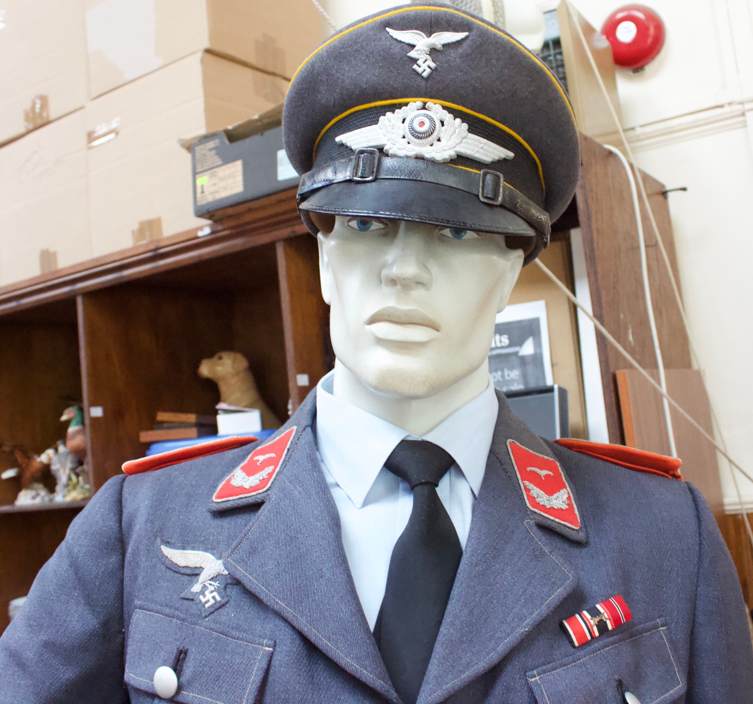 A WWII German Third Reich Luftwaffe uniform on mannequin dummy, comprising peaked cap, jacket with - Image 2 of 5