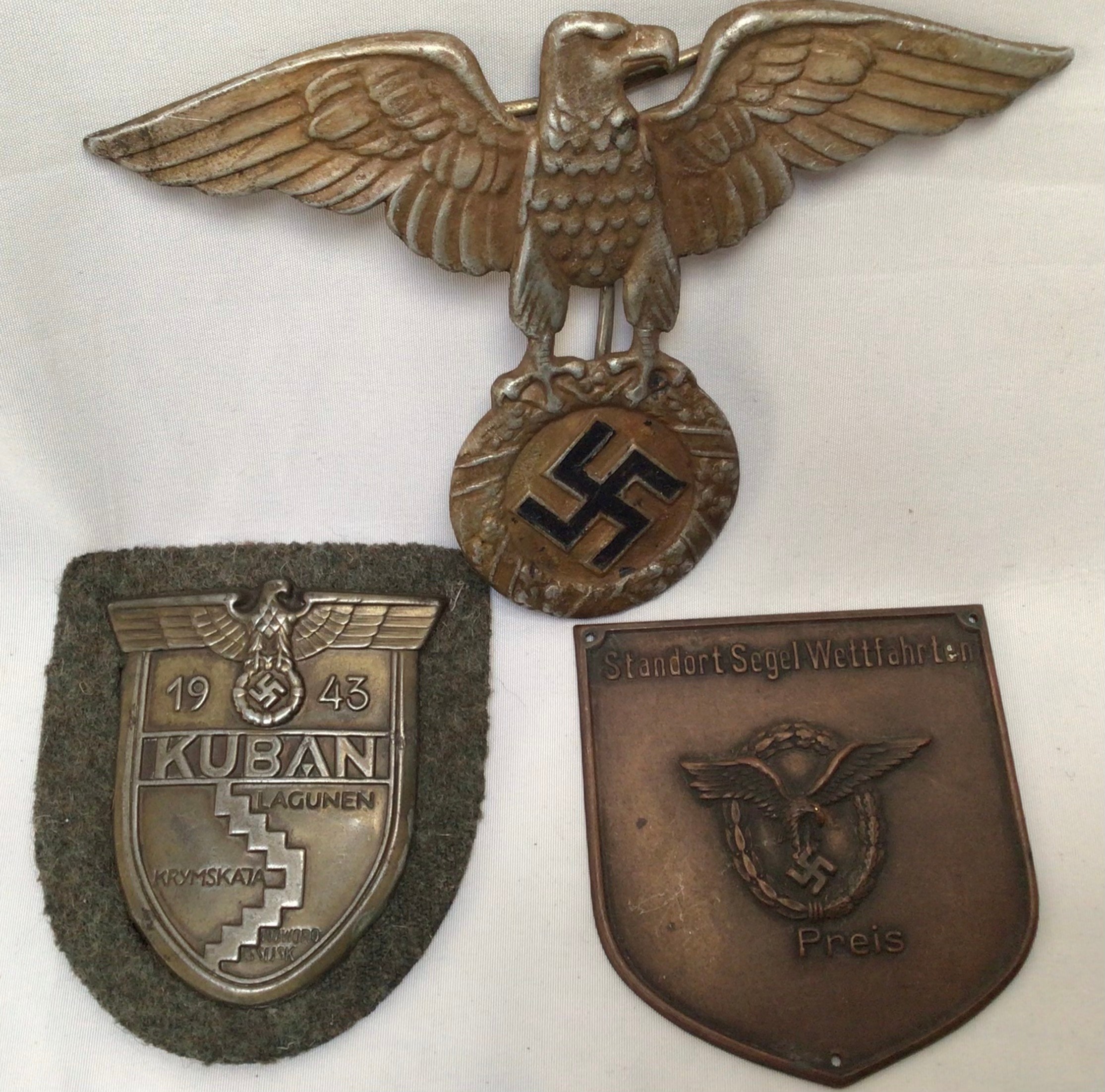 WWII German Third Reich: Four campaign shields, and seven various badges. (11) - Image 8 of 8