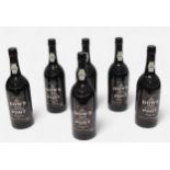 Six bottles of Dow’s 1985 vintage port, 75cl, all sealed with labels intact