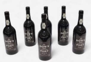 Six bottles of Dow’s 1985 vintage port, 75cl, all sealed with labels intact