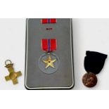 An Italian East Africa Campaign Medal 1936, A Spanish Cross of Military Merit (Civil War), and a