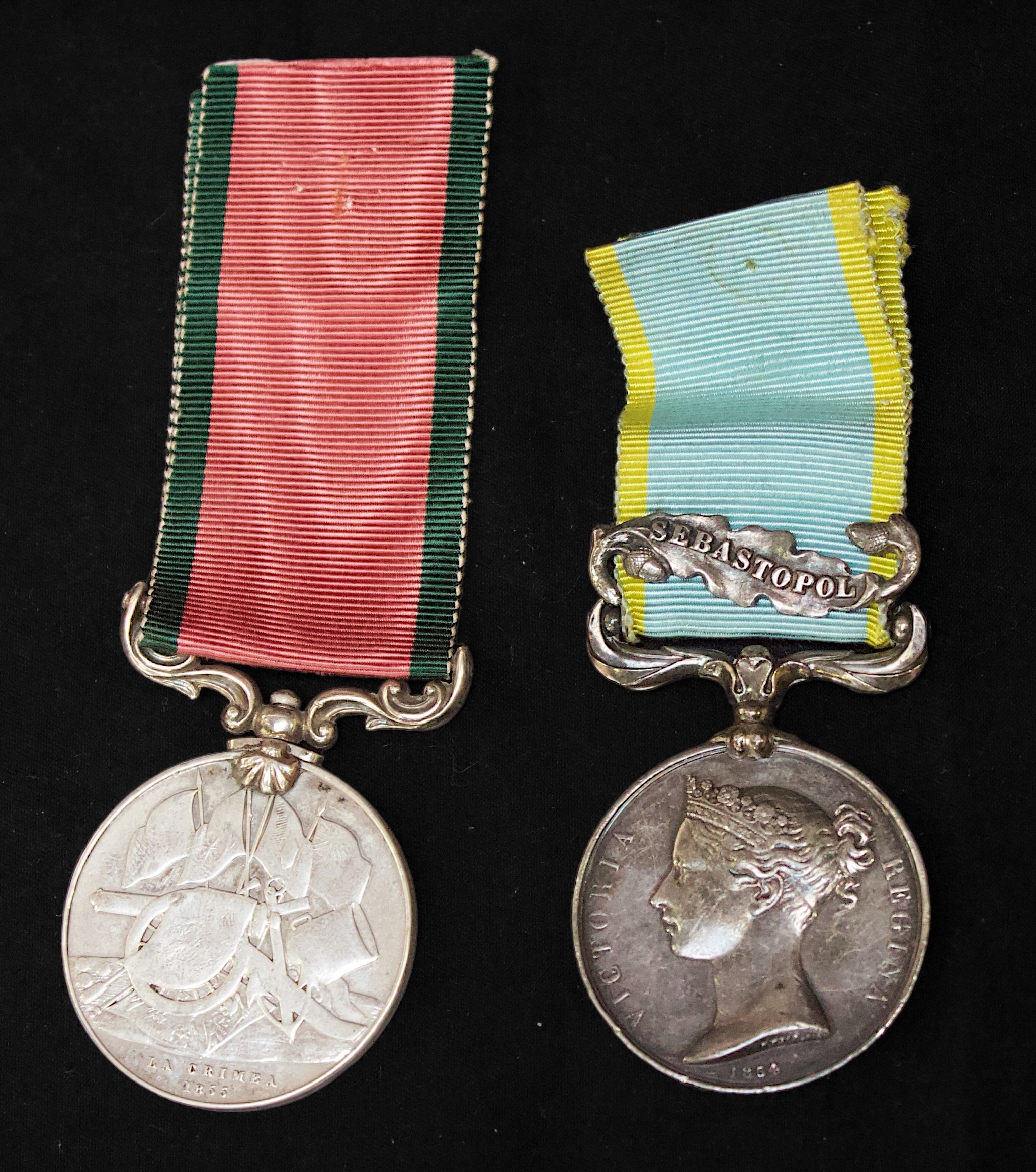 A Queen Victoria Crimea Medal with Sebastopol Clasp to 'G. JOHNSON H.M. SHIP ALGIERS, with ribbon,