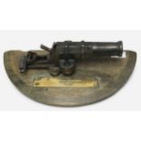 A Victorian gamekeepers poachers Alarm, miniature iron cannon, presented as a memento of service,