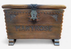 A replica oak 'treasure-chest' or coffer, with iron hasp and staple, hinges and lock, studded