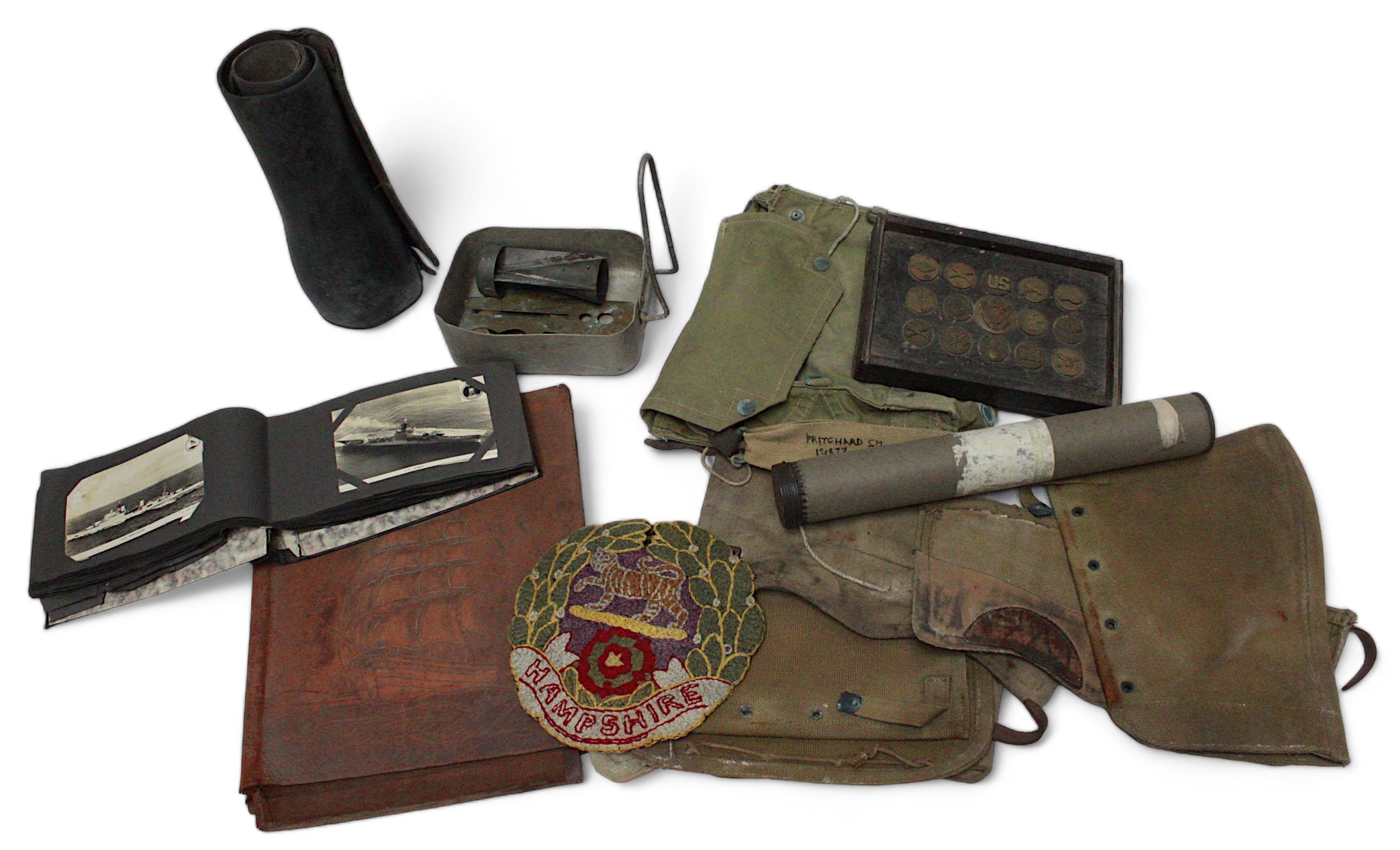 A collection of assorted military collectables including a First World War German Iron Cross