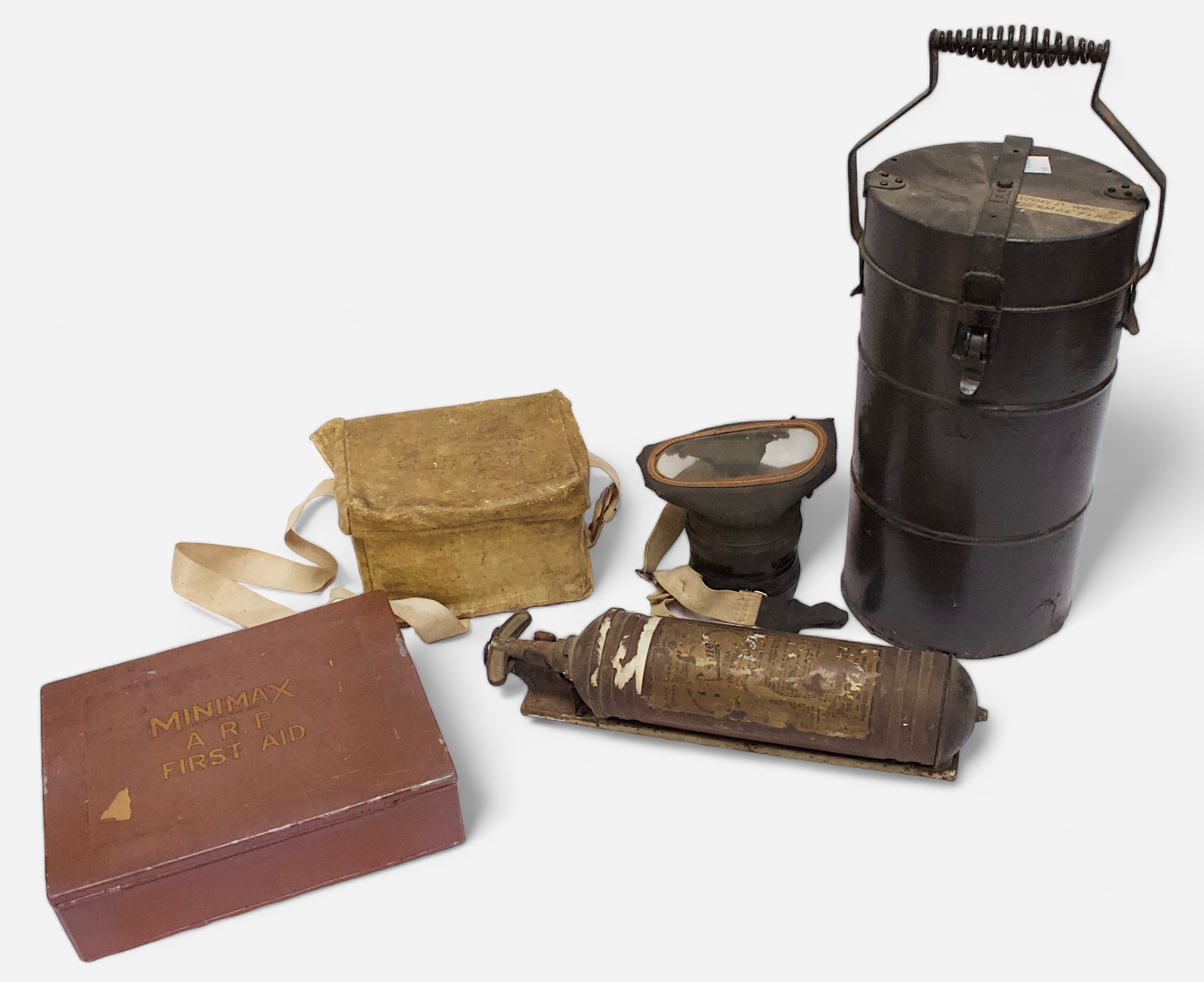 A WWII Minimax A.R.P. First Aid tin and contents, together with two WWII British Royal Forces gas
