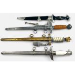 Four reproduction German Third Reich Dress Daggers, comprising SS dagger, Kriegsmarine, Army