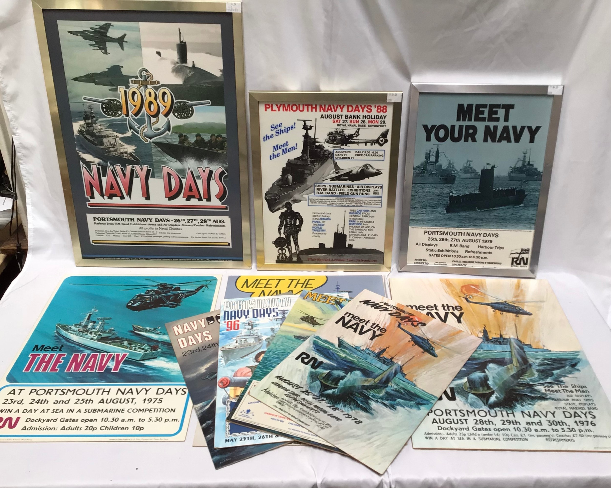 A collection of ten assorted Navy Days advertising posters on board, some framed, largest measures