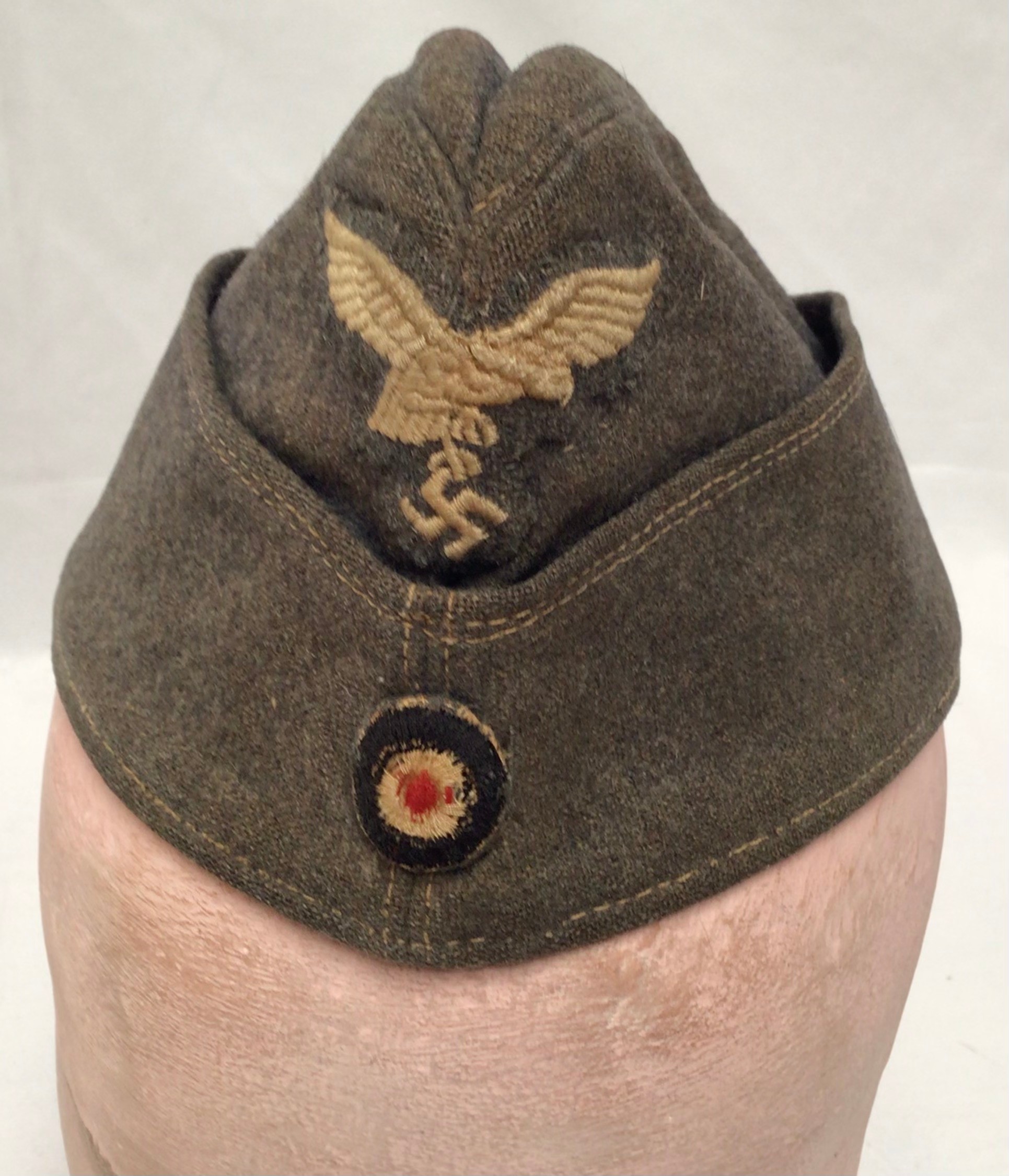 A German WWII Third Reich Luftwaffe side cap, together with a reproduction German WWII Third Reich - Bild 2 aus 3