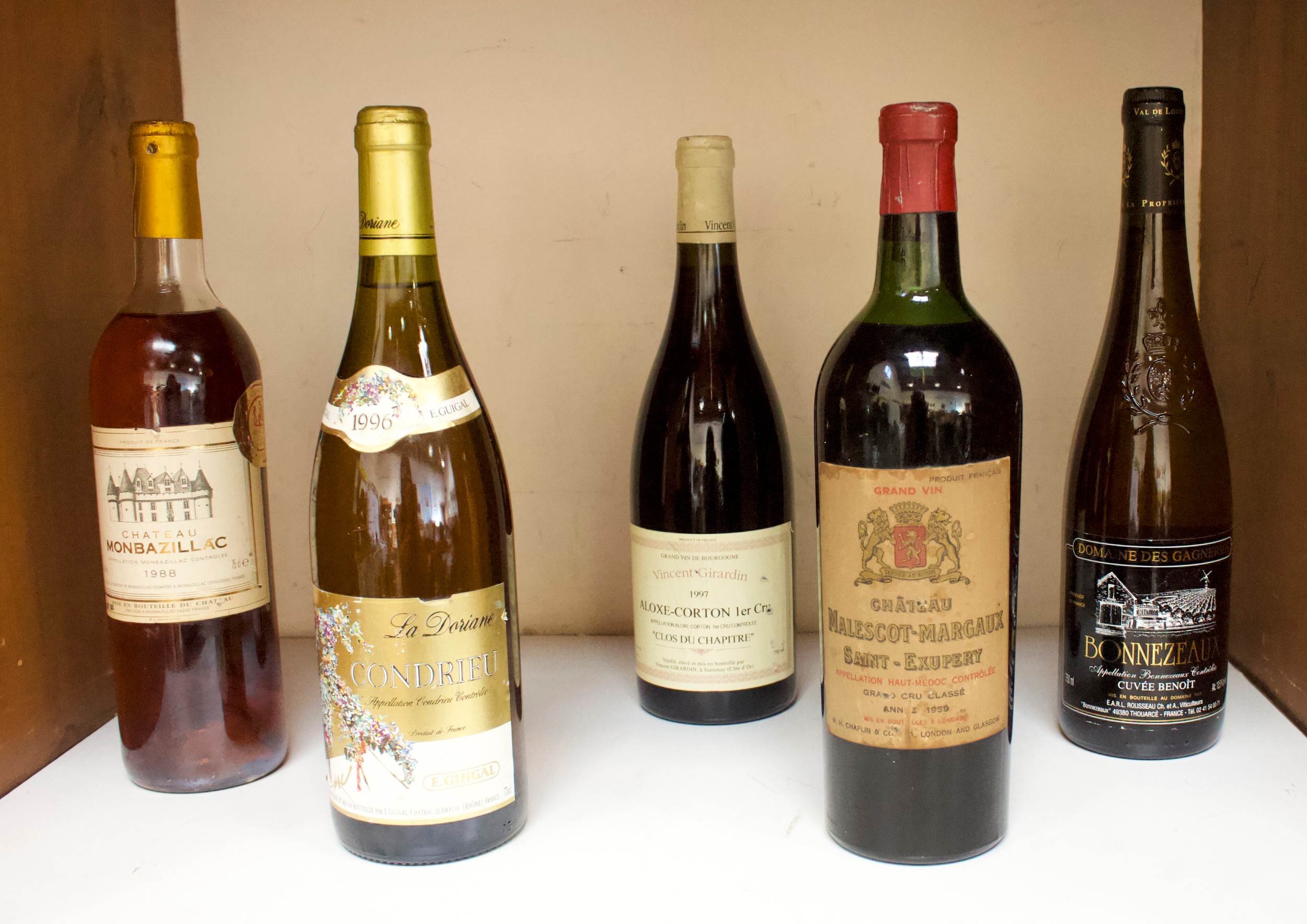 Five various bottles of vintage wine, comprising Chateau Malescot-Margaux, Saint-Exupery, Grand Cru,