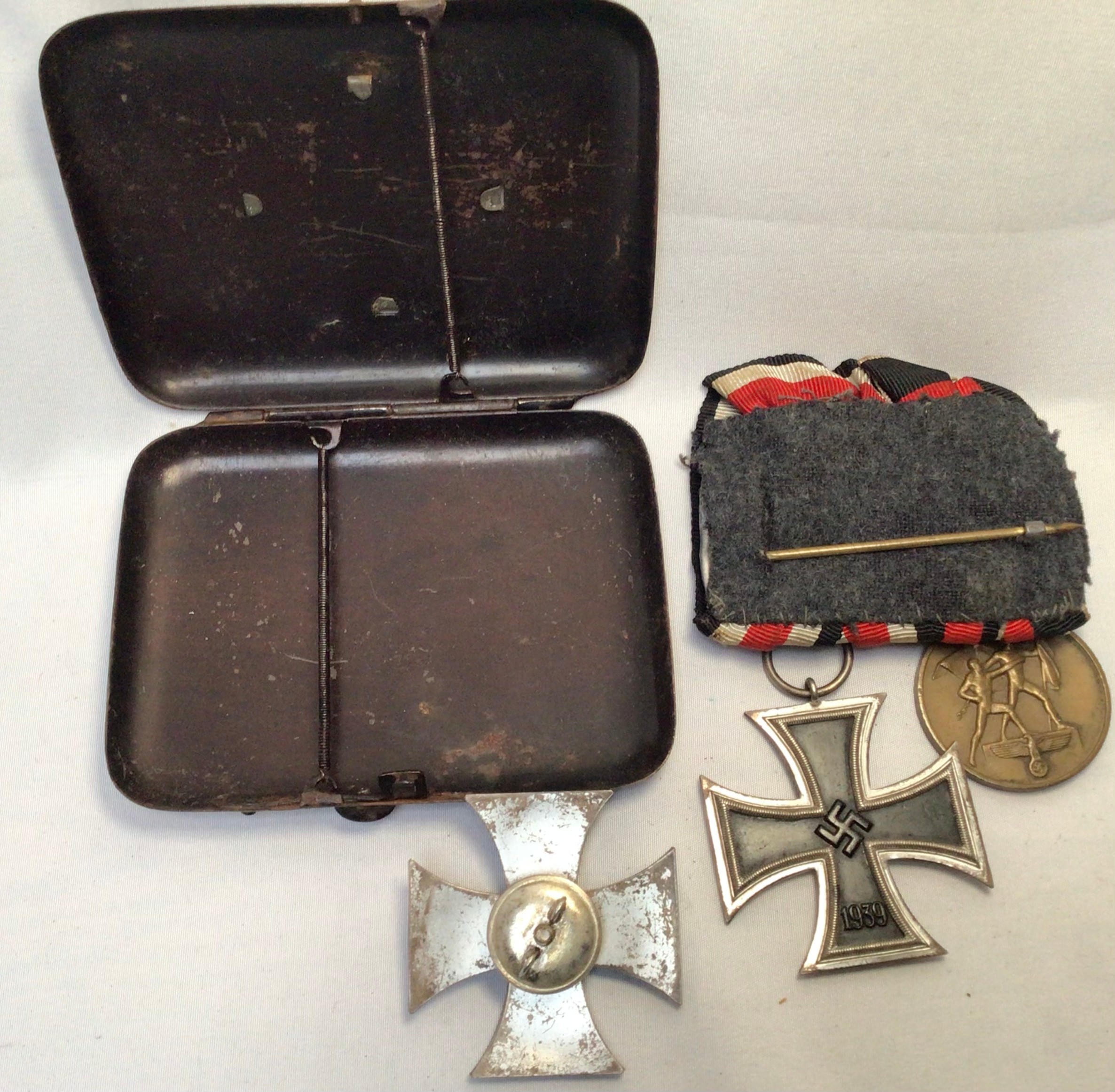 A WWI German Iron cross with crown above ‘W’ above date 1914, with screw on back, together with a - Image 2 of 2