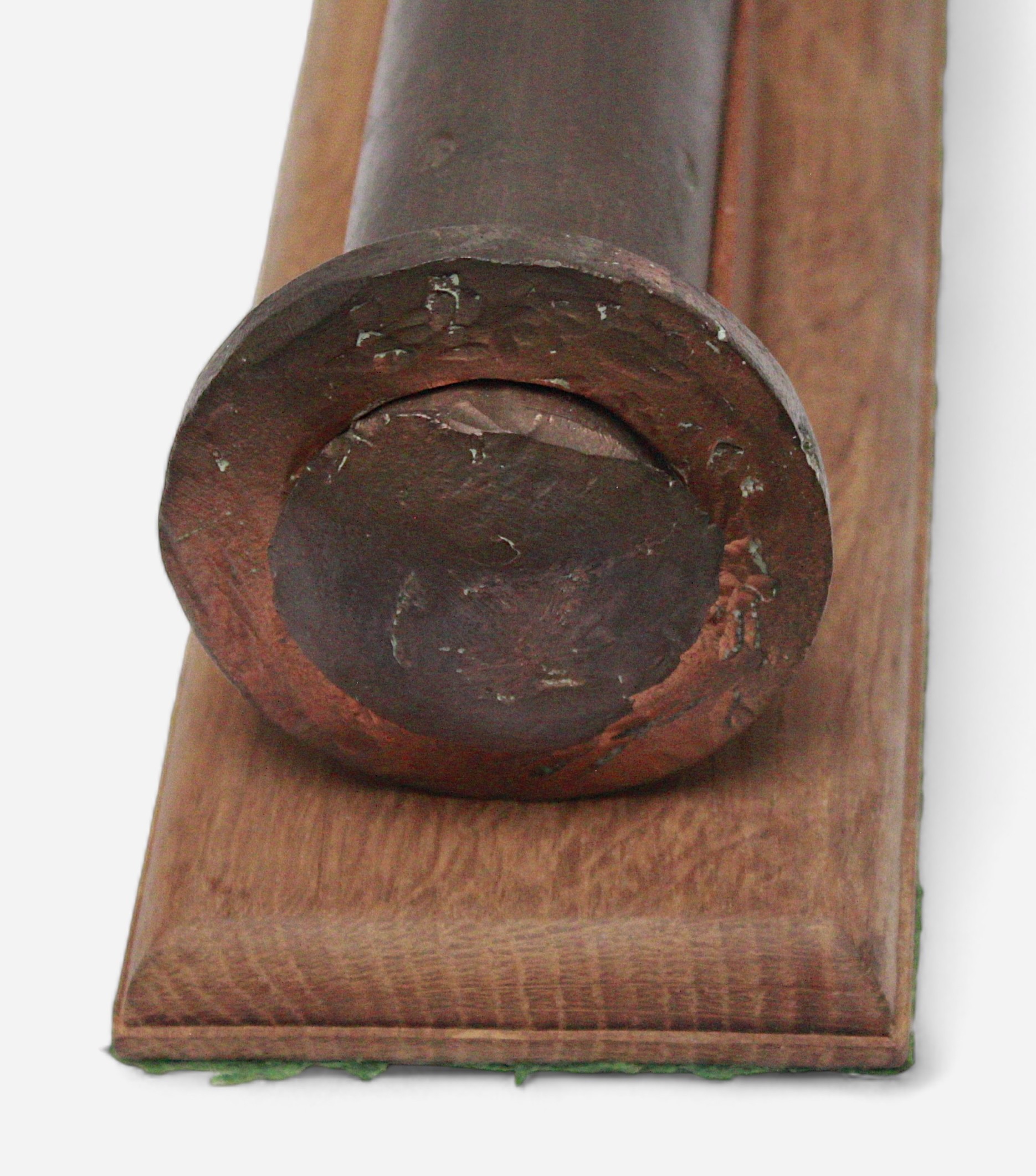 A large copper rivet, with multiple broad arrow stamps and mounted on fitted wooden stand, 33cm long - Image 4 of 4