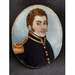 A 19th century oval portrait miniature of a naval officer, with brown curly hair and short