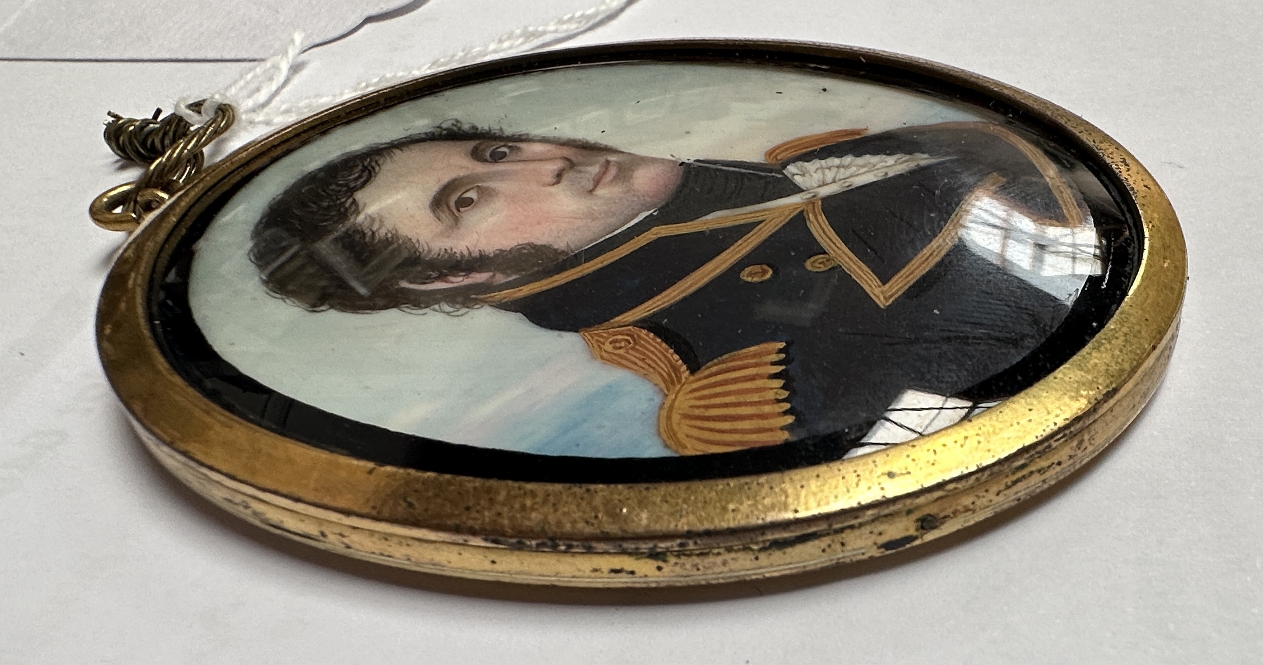 A Mid-19th century oval portrait miniature of a senior Naval officer, with black curly hair and - Image 6 of 7