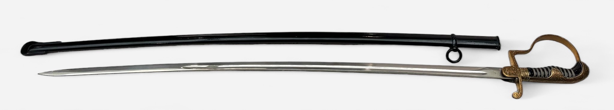 A WWII German Third Reich Officer's Dress Sword, with 32'' slightly curved fullered blade, ricasso