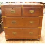 A 19th Century brass-bound teak military chest of two short and two long drawers with flush brass