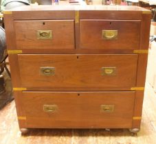 A 19th Century brass-bound teak military chest of two short and two long drawers with flush brass
