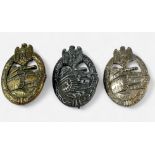 Three various WWII German Third Reich Panzer Assault badges, brass-plated alloy example with cast SA