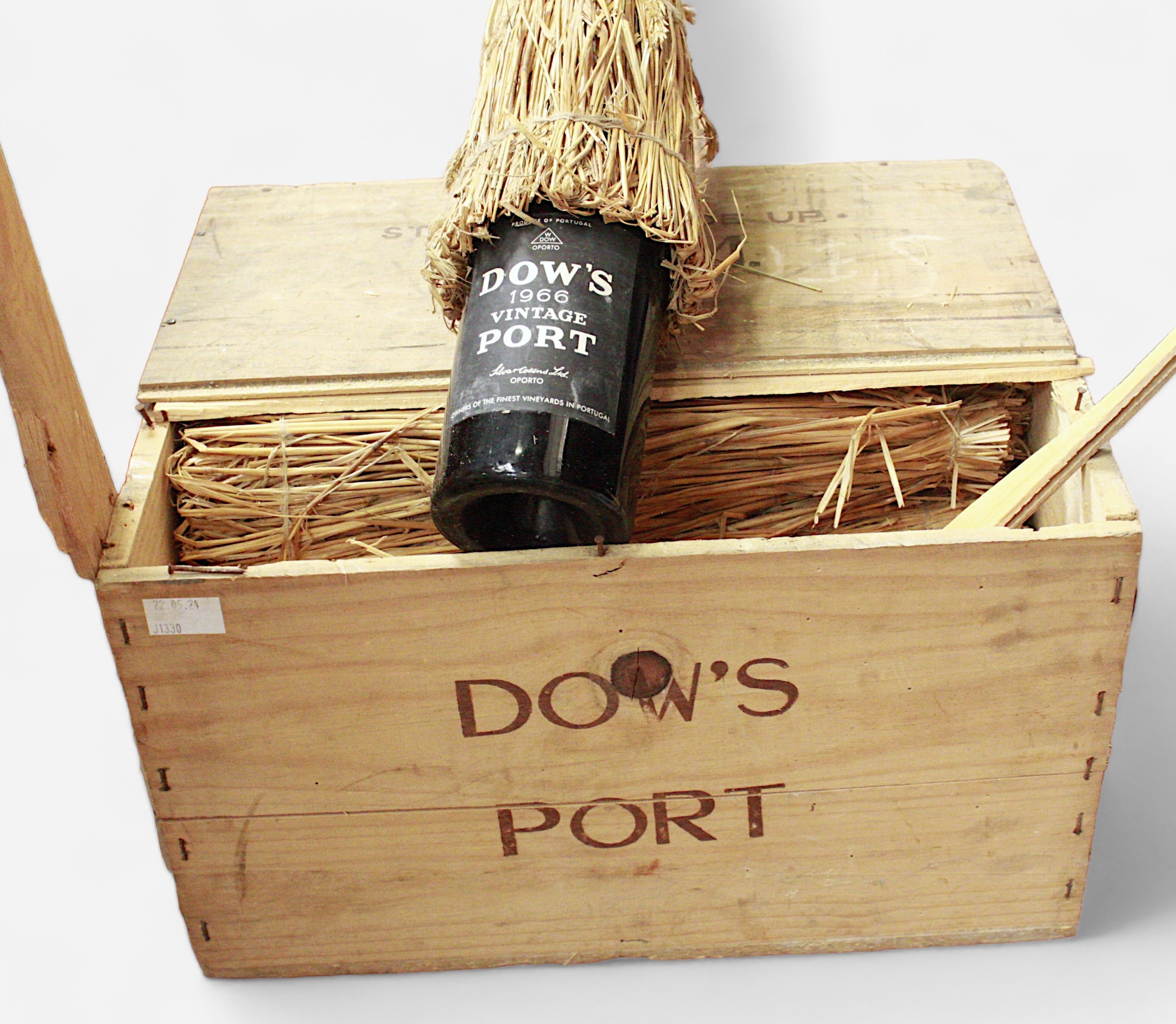 A case of 12 bottles of 1966 vintage Dow’s port, all unopened with labels intact and wax seals to