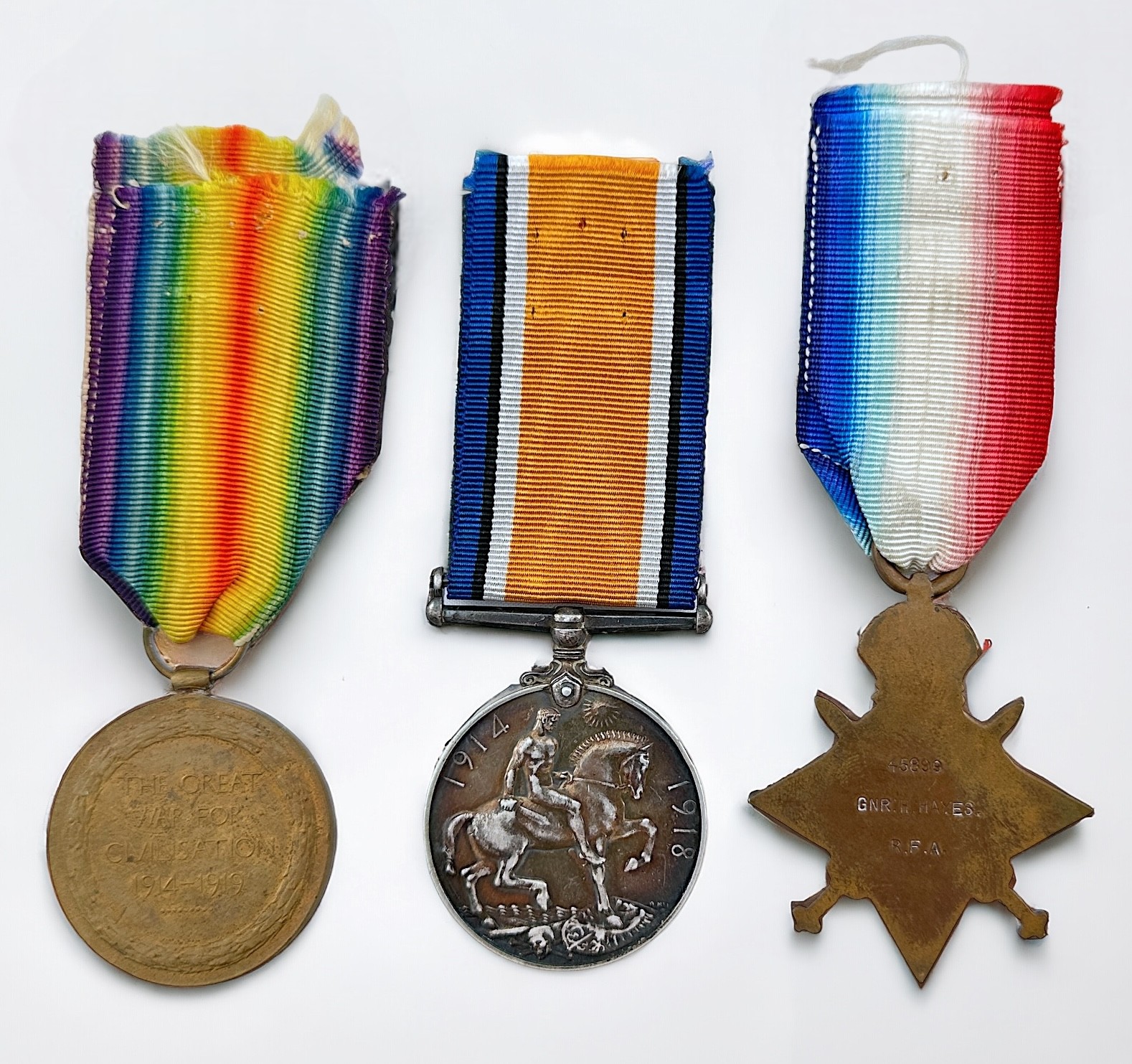 A WW1 Royal Artillery Trio to 45899 GNR. H. Hayes R.F.A. comprising 1914 Mons Star, War Medal and - Image 2 of 2