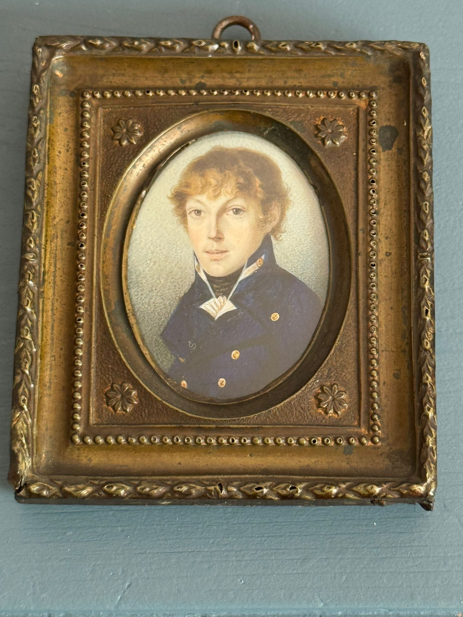 A 19th century oval portrait miniature of a young Naval Midshipman, with light brown long wavy hair, - Image 2 of 2