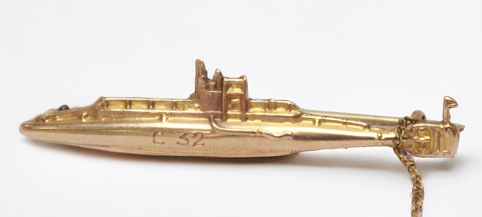 A 9ct gold sweetheart brooch modelled as a British C-Class submarine, engraved ‘C32’ to the side, - Image 2 of 2