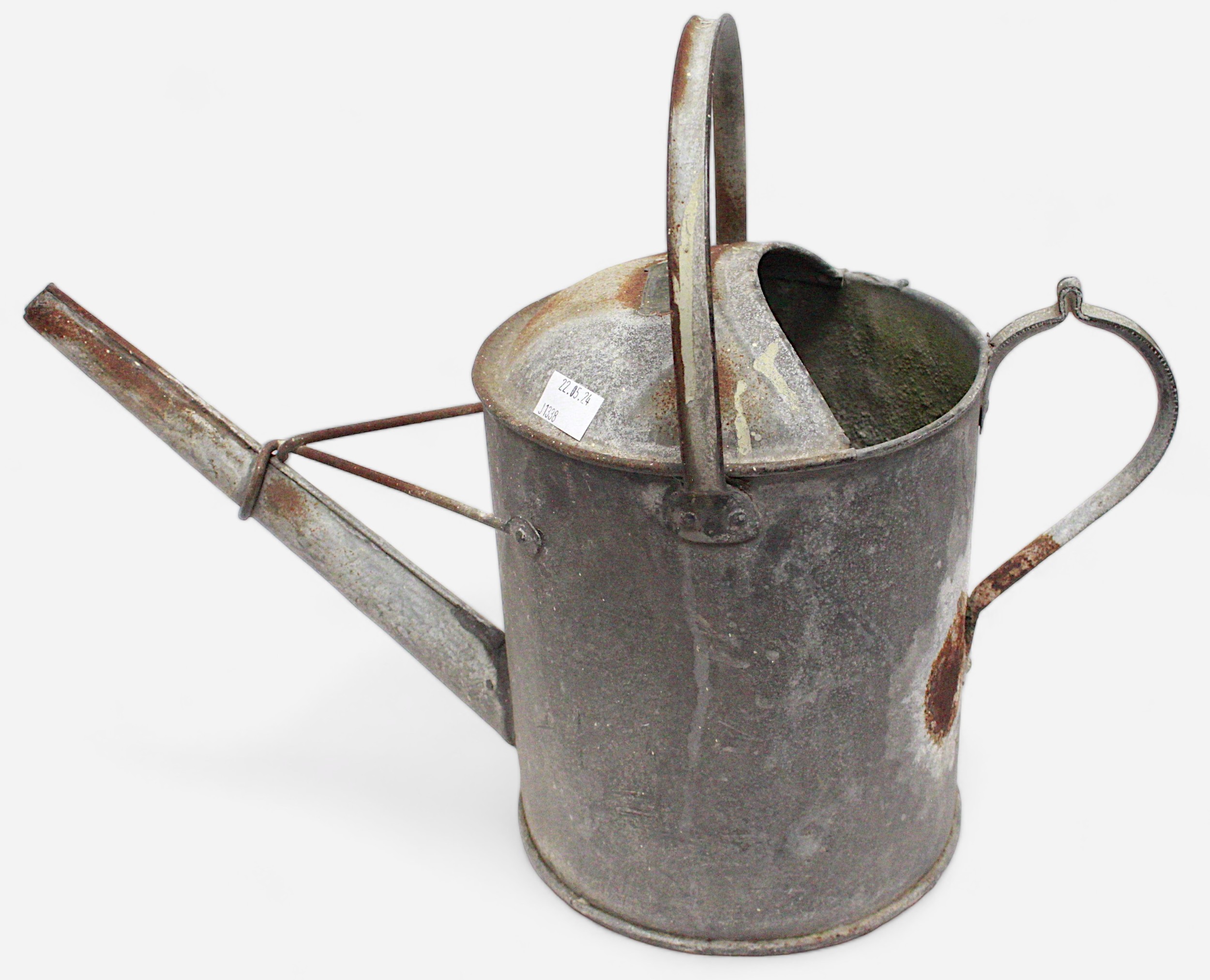 A WWII German Third Reich galvanised metal 2 Gallon watering can, the base embossed with a Swastika.