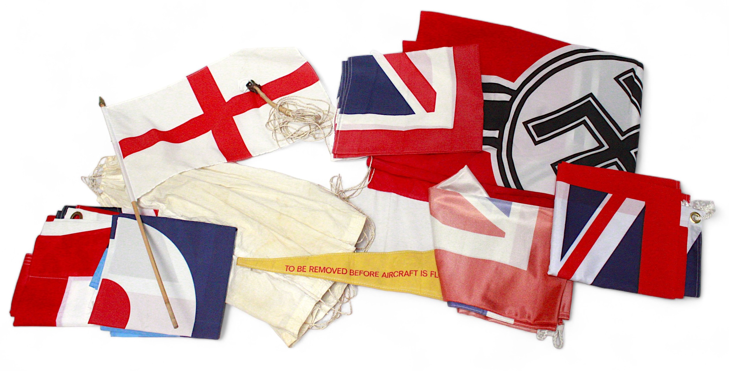 A white silk pilot chute, Aircraft pennant, together with various Union Jacks and German flag