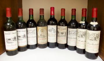 A collection of nine bottles of vintage red wine including two bottles of Chateau La Croix