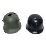 A WW2 German Third Reich M34 Police Helmet, six-tongue leather liner, size 57. together with a WW1