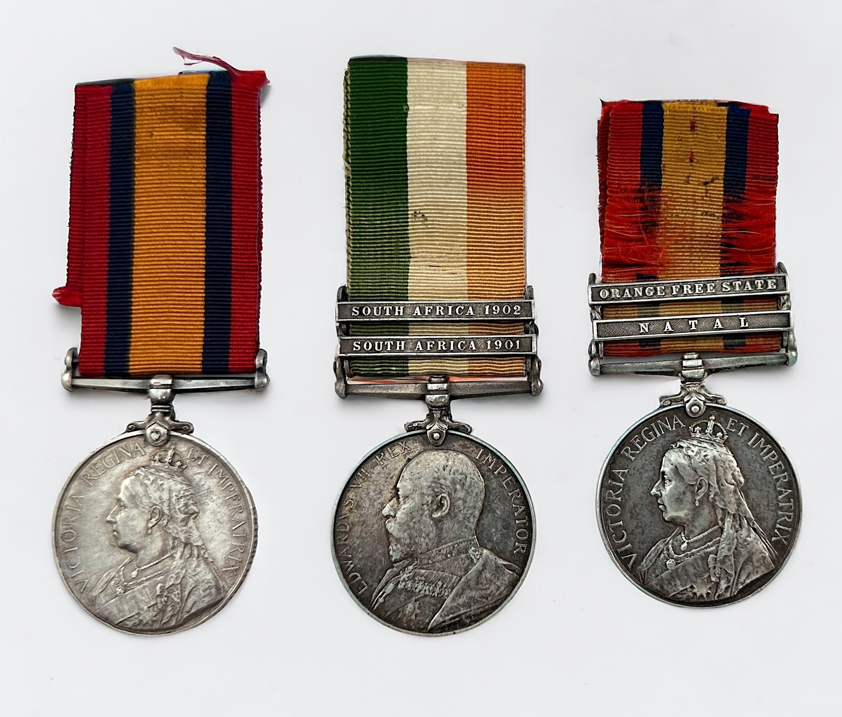 A Queen's South Africa Medal with two clasps Natal and Orange Free State, (name worn of filed),