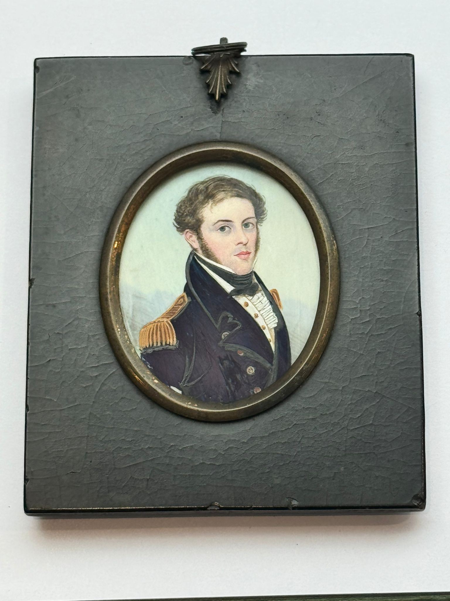 Attributed to Frederick Buck (1771 – c1839/40), A 19th century oval portrait miniature of a Naval