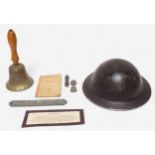 A collection of British WWII Air Raid Precautions (ARP) collectables, comprising a black painted