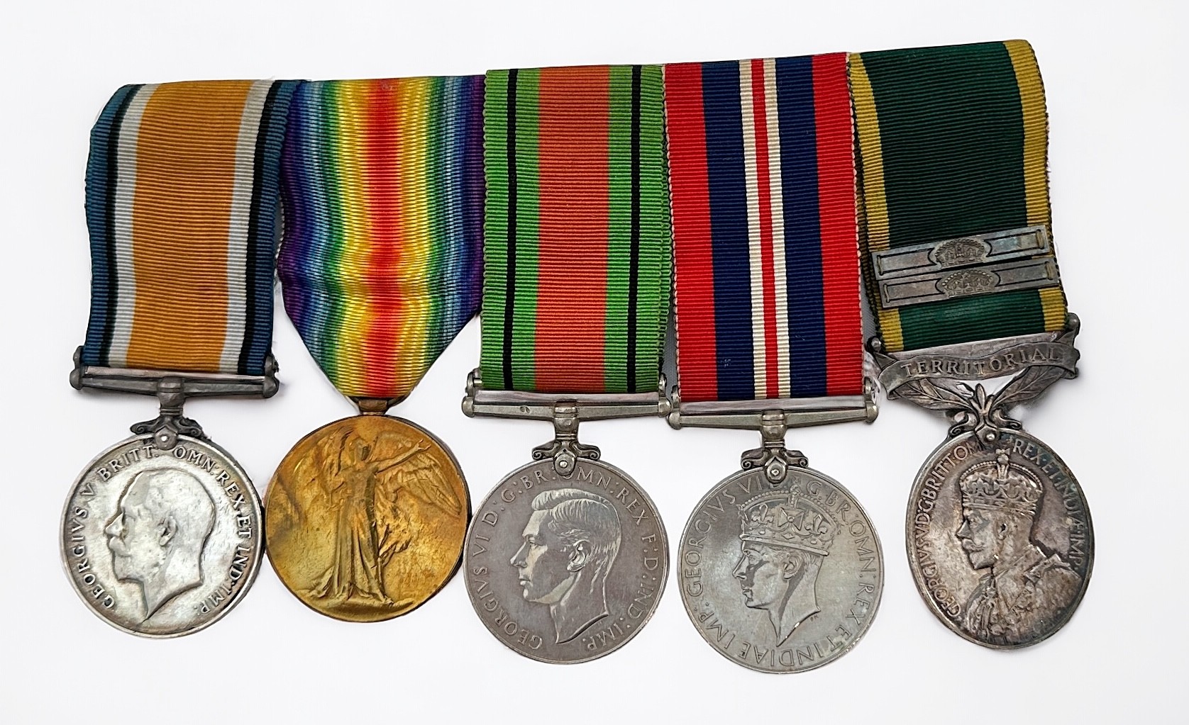 A WW1 & WW2 group of five, comprising War Medal and Victory Medal to G-29760 Pte E.G. Kearvell The