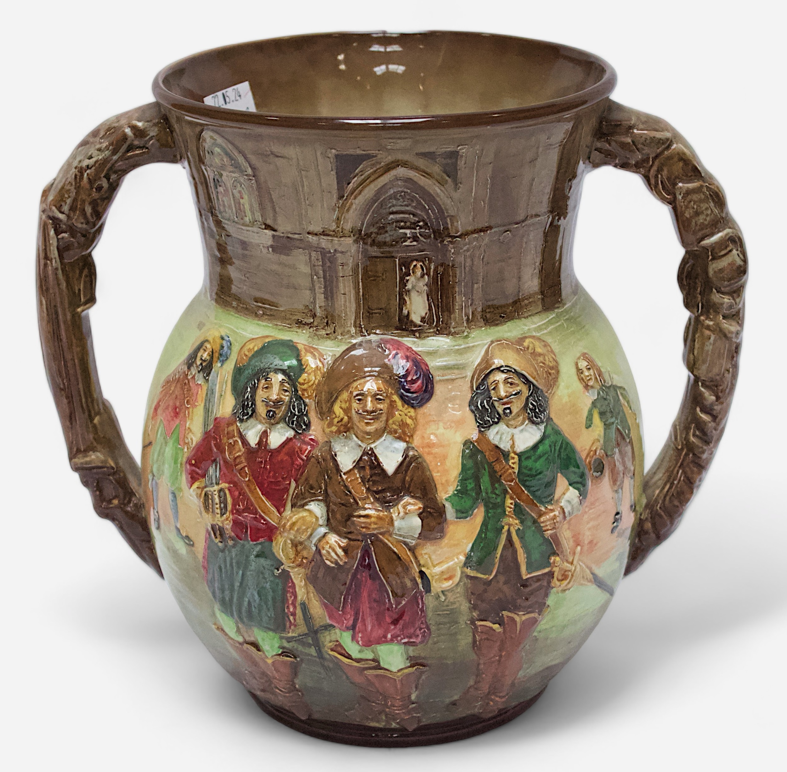 A Royal Doulton loving cup, ‘The Great Romance of Louis XIII Reign’ The Three Musketeers by Dumas,