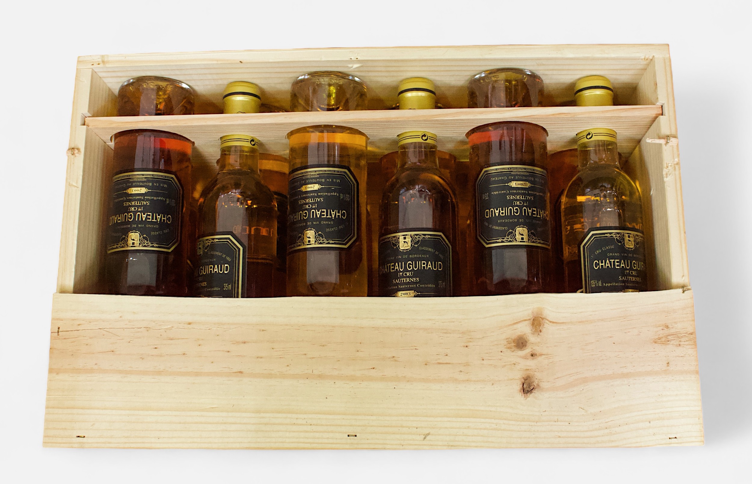 A case of twelve half bottles, 375ml, of Chateau Guiraud Sauternes, 2003 vintage, 1ER Cru Classe (