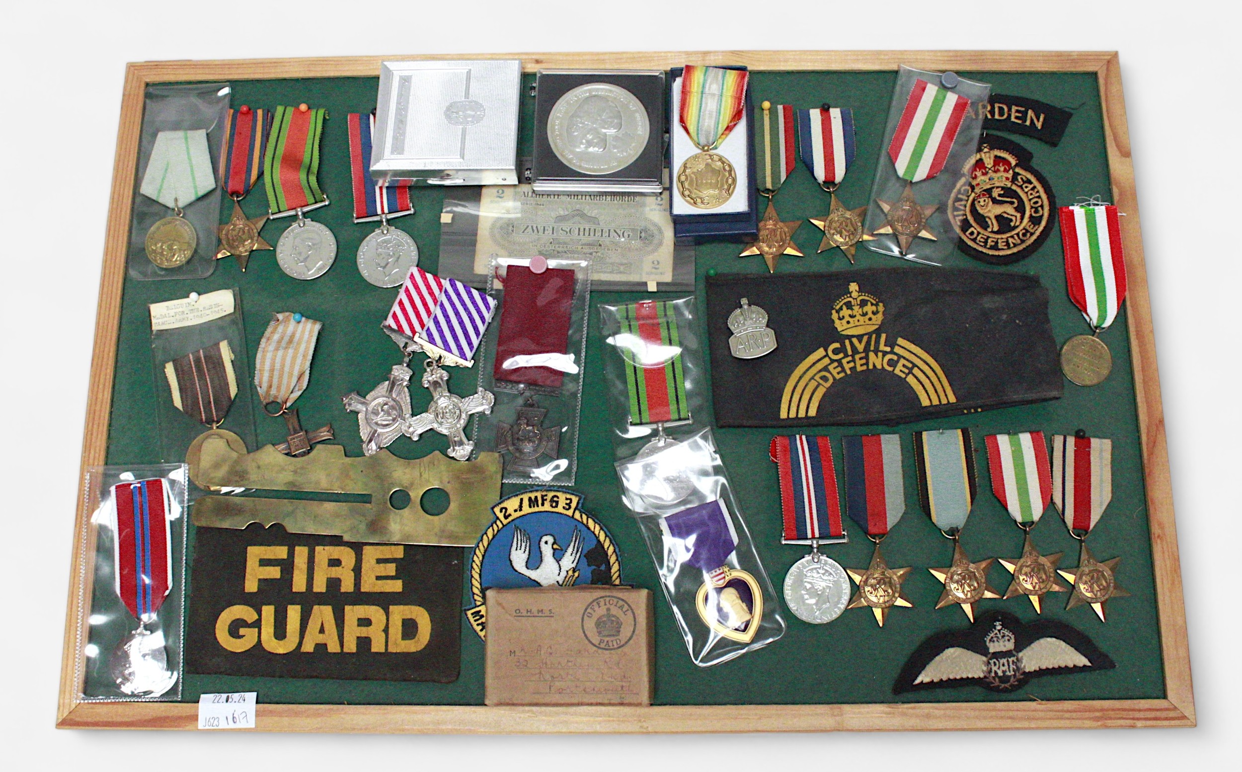 A collection of WW2 British medals, various replica medals, Civil Defence and Fire Guard armbands,