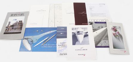 A small collection of assorted Concorde ephemera including signed flight certificates, a pen, a case