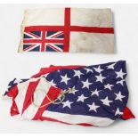 A small white ensign flag, with ‘Zephyr Racing Pennants Ltd’ and broad arrow stamp, 90cm long,
