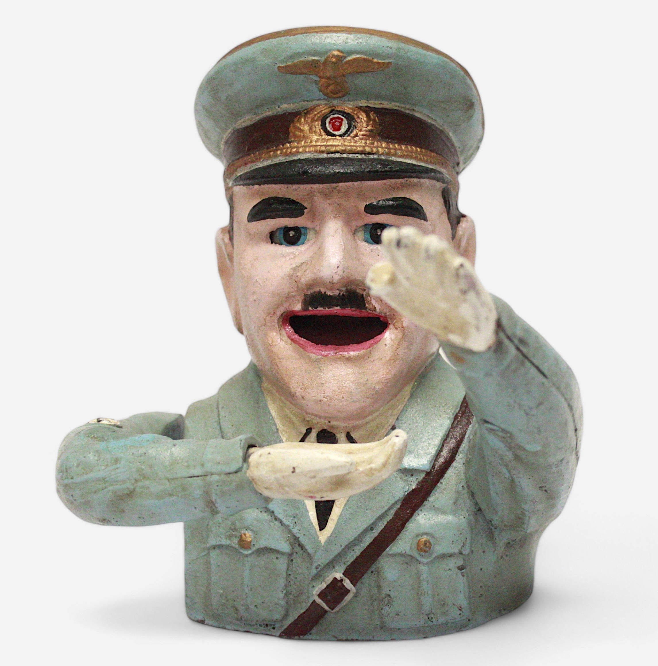 A novelty cast iron money box modelled as Adolf Hitler, inscribed Hamburg 1936 to base, 17cm tall