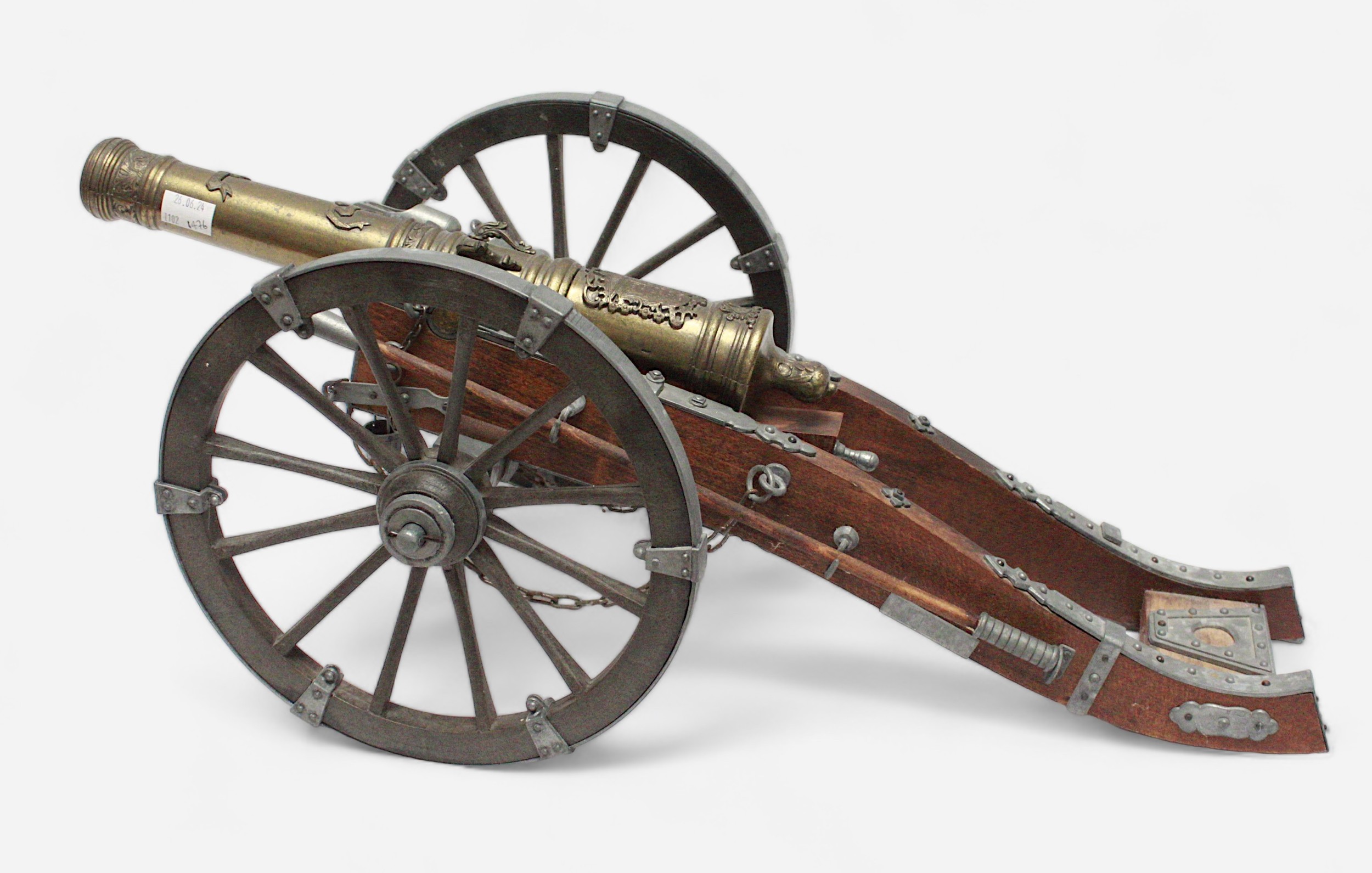 A scale model of a 19th Century French Muzzle-Loading Cannon, on two wheel carriage with loading and