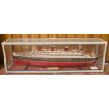 A large scratch built model of the White Star Line RMS Queen Mary, with wood effect deck,