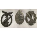 Three German WWII military badges, comprising Luftwaffe Anti-Aircraft Flak Battle Badge, Infantry