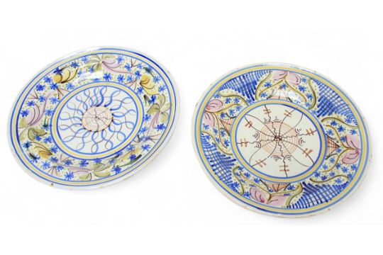 Two French Faience pottery chargers with polychrome stylised floral decoration, 34.5cm diameter, - Image 1 of 3