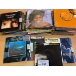 Records : Box containing 150+ singles, rock/pop mi