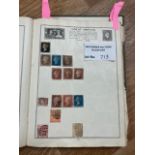 Stamps : Battered old Triumph album with decent al