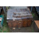 A metal trunk and a metal medicine cabinet.